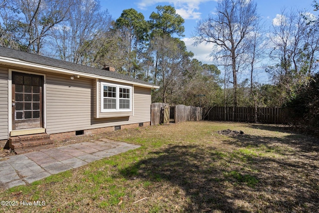 view of yard with entry steps and fence