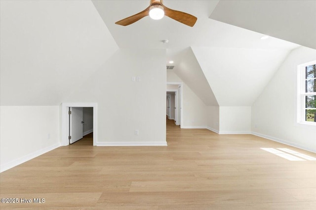 1708 Oakbrook Dr SW, Ocean Isle Beach, NC 28469 - additional living space with vaulted ceiling, light wood finished floors, and a ceiling fan