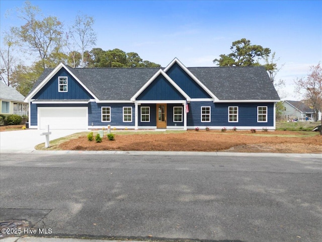 1708 Oakbrook Dr SW, Ocean Isle Beach, NC 28469 - view of front of house with concrete driveway, a porch, a garage, and roof with shingles