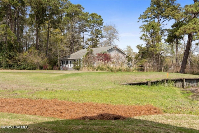 1708 Oakbrook Dr SW, Ocean Isle Beach, NC 28469 - view of green lawn