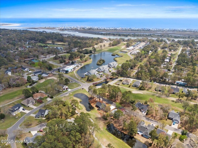 1708 Oakbrook Dr SW, Ocean Isle Beach, NC 28469 - aerial view of property and surrounding area featuring nearby suburban area, a nearby body of water, and a golf club