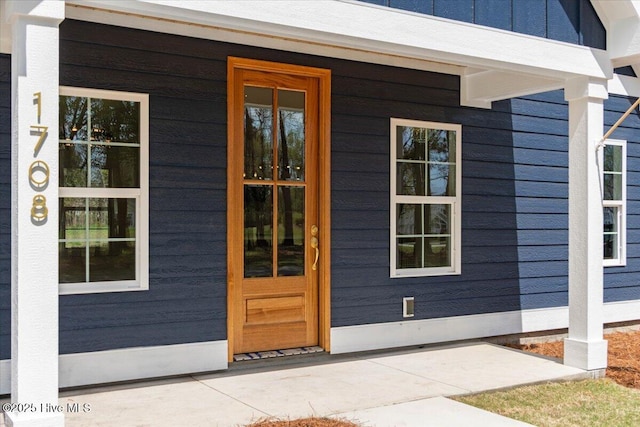 1708 Oakbrook Dr SW, Ocean Isle Beach, NC 28469 - view of exterior entry with covered porch