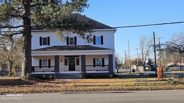 traditional style home with covered porch