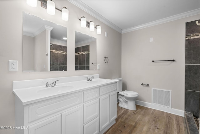 920 Shelter Creek Dr, Burgaw, NC 28425 - full bathroom with baseboards, crown molding, visible vents, and a sink