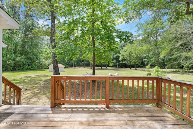 920 Shelter Creek Dr, Burgaw, NC 28425 - wooden terrace with a storage shed, an outbuilding, and a lawn