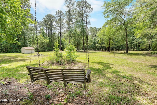920 Shelter Creek Dr, Burgaw, NC 28425 - view of home's community featuring a storage shed, an outdoor structure, and a lawn