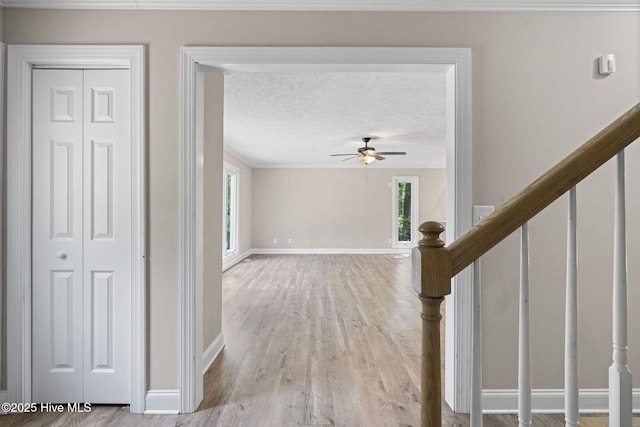 920 Shelter Creek Dr, Burgaw, NC 28425 - hall with crown molding, wood finished floors, baseboards, and stairs
