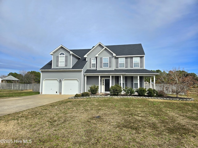 view of front of home with a front lawn, fence, concrete driveway, covered porch, and a garage