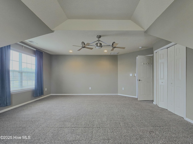 carpeted empty room with recessed lighting, ceiling fan, a textured ceiling, and baseboards