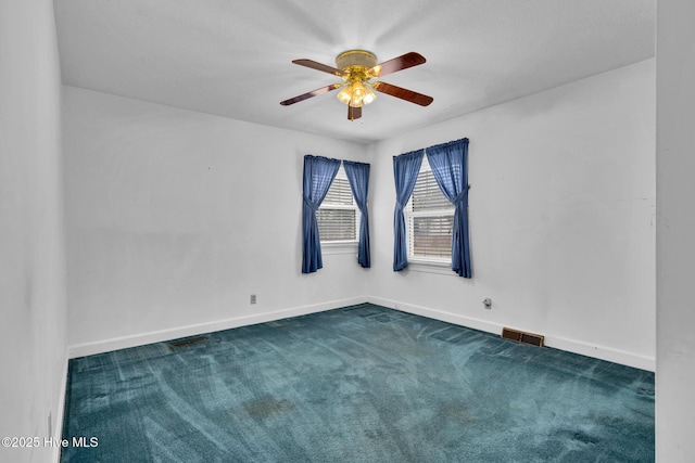 211 Brandon Ave, Tarboro, NC 27886 - carpeted spare room with baseboards, visible vents, and a ceiling fan