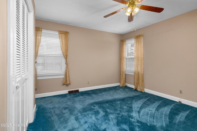 211 Brandon Ave, Tarboro, NC 27886 - carpeted spare room with visible vents, ceiling fan, and baseboards