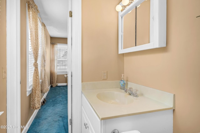 211 Brandon Ave, Tarboro, NC 27886 - bathroom with baseboards and vanity