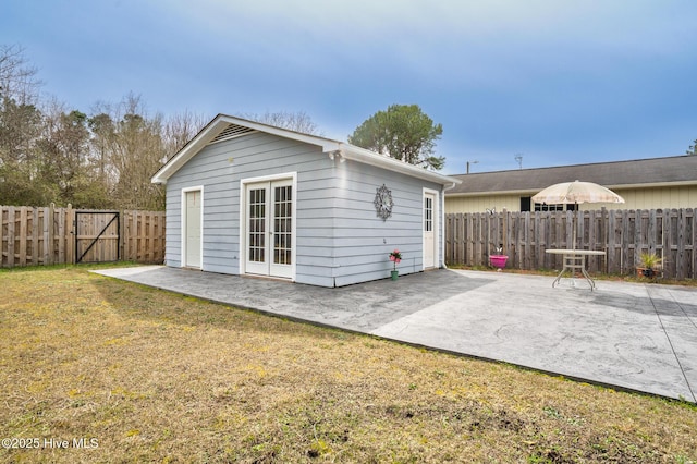 211 Brandon Ave, Tarboro, NC 27886 - exterior space with a gate, a patio area, a lawn, and fence
