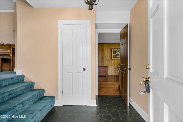 211 Brandon Ave, Tarboro, NC 27886 - foyer featuring stairs, baseboards, and wooden walls