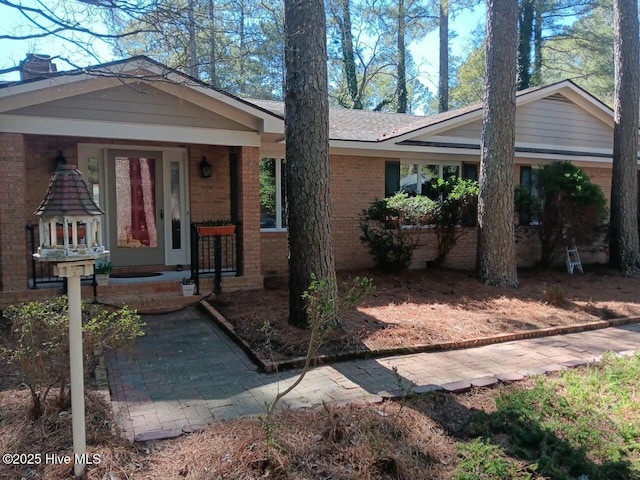 ranch-style home with brick siding