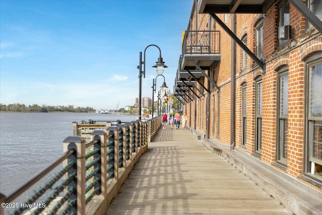 dock area with a water view