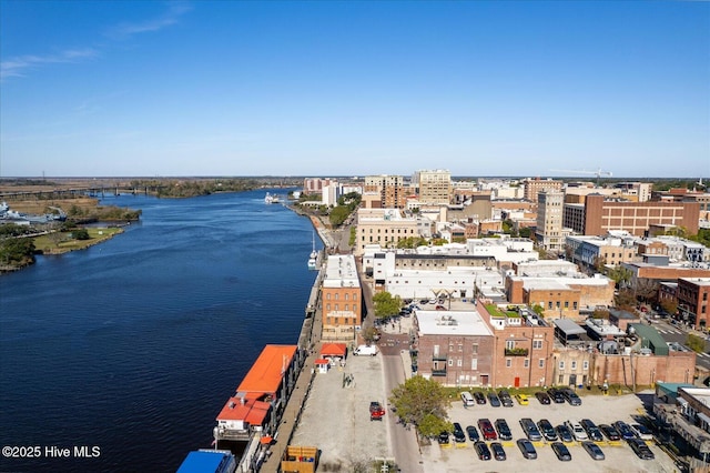 bird's eye view featuring a water view and a view of city