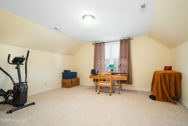 home office with vaulted ceiling, carpet flooring, baseboards, and visible vents