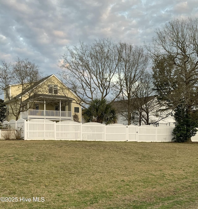 view of yard with a gate and a fenced front yard