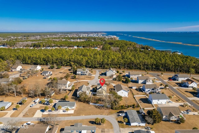 bird's eye view with a water view and a residential view