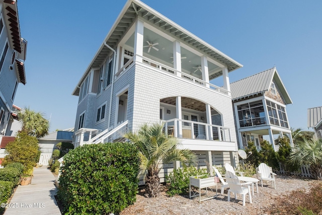 view of property exterior with ceiling fan