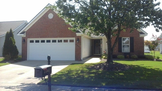 view of front of house with a garage, driveway, brick siding, and a front yard