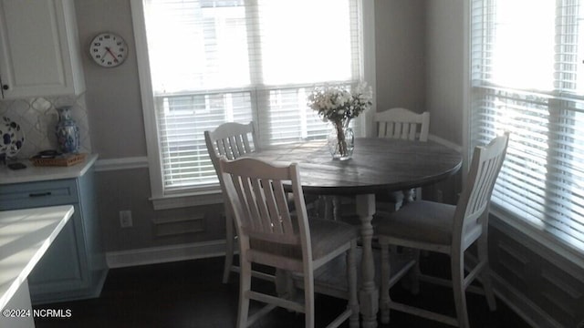 dining room featuring baseboards