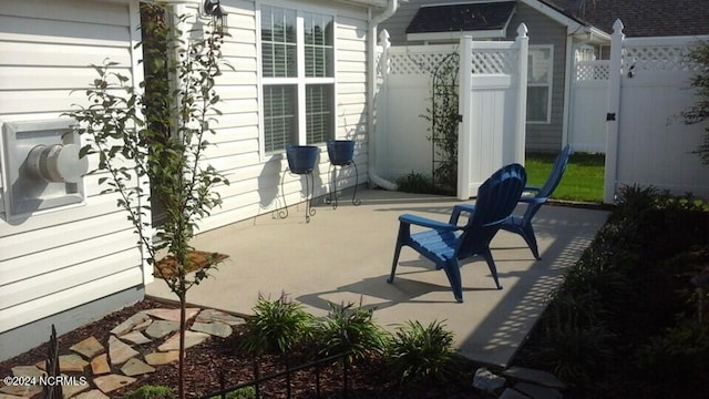 view of patio with fence