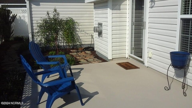 view of patio / terrace with fence