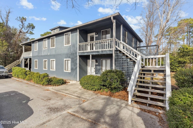 view of front of home featuring stairs