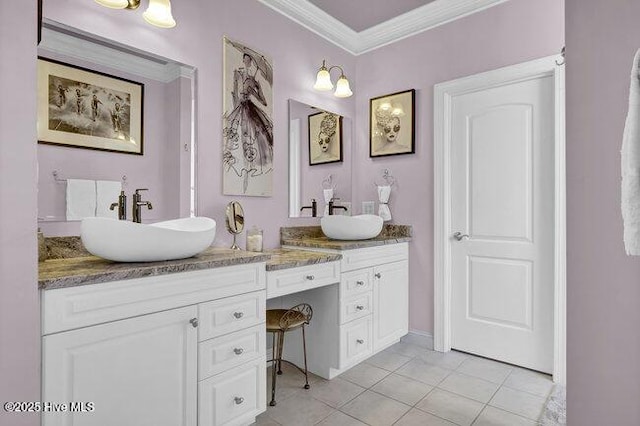 full bathroom with double vanity, crown molding, a sink, and tile patterned floors