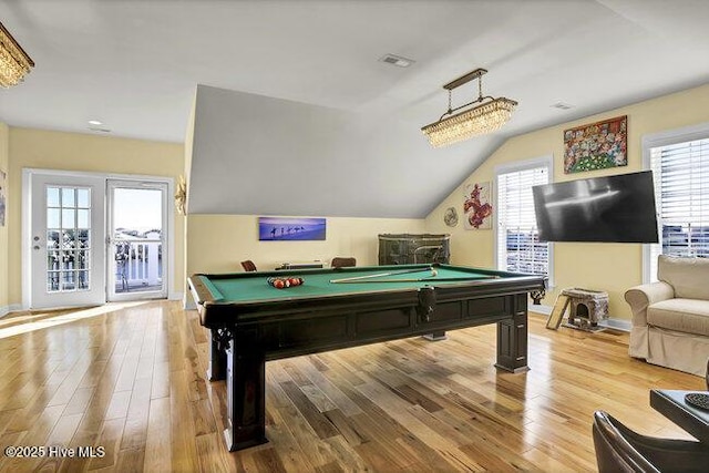 game room featuring vaulted ceiling, light wood finished floors, billiards, and visible vents