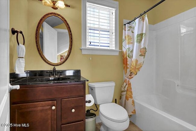 bathroom featuring vanity, toilet, and shower / bathtub combination with curtain