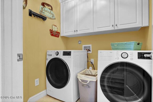 laundry area featuring cabinet space and washer and dryer