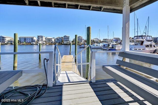 dock area with a water view