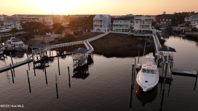 dock area featuring a water view and boat lift