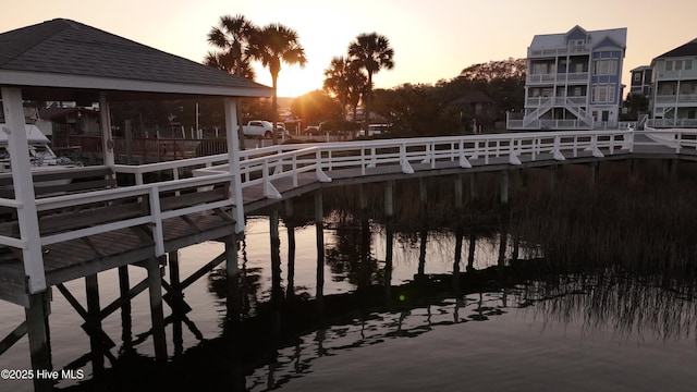 dock area featuring a gazebo and a water view