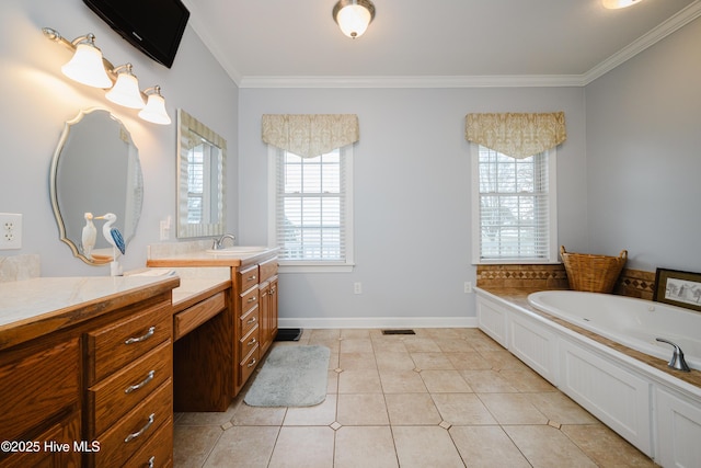 bathroom featuring baseboards, ornamental molding, tile patterned floors, vanity, and a bath