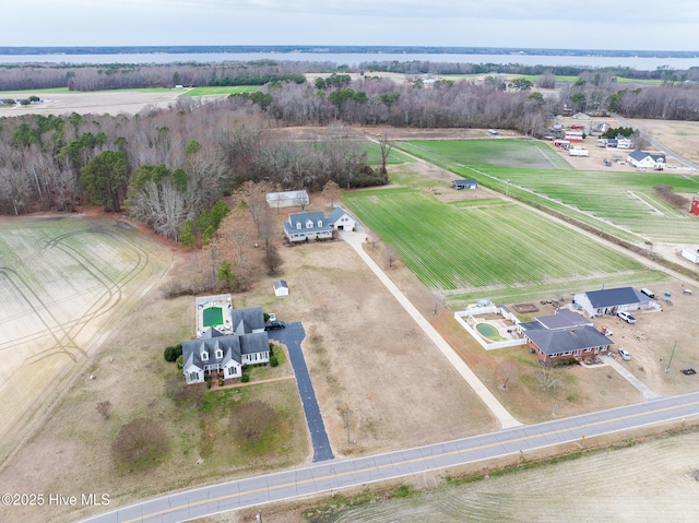 birds eye view of property with a rural view