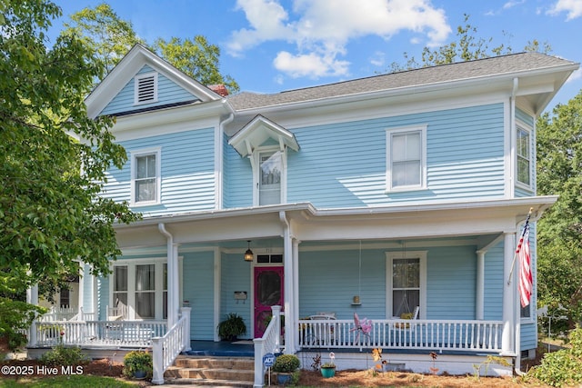 view of front of home featuring covered porch