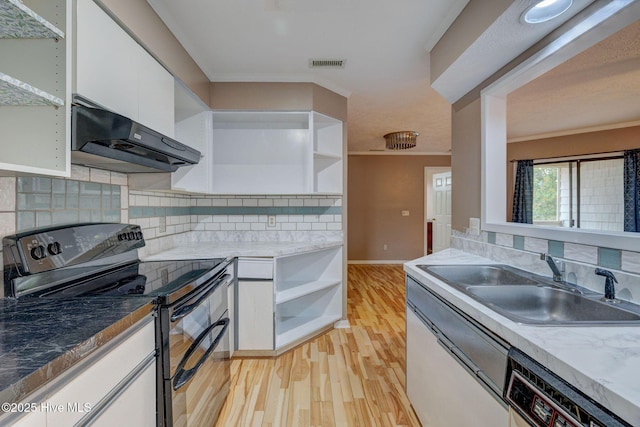 kitchen with dishwashing machine, visible vents, open shelves, range with two ovens, and a sink