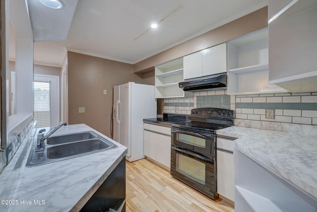 kitchen with open shelves, under cabinet range hood, a sink, and range with two ovens