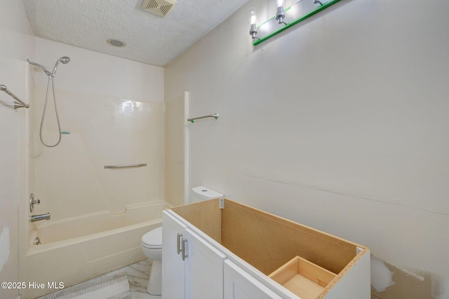 bathroom featuring visible vents, toilet, a textured ceiling, and shower / tub combination