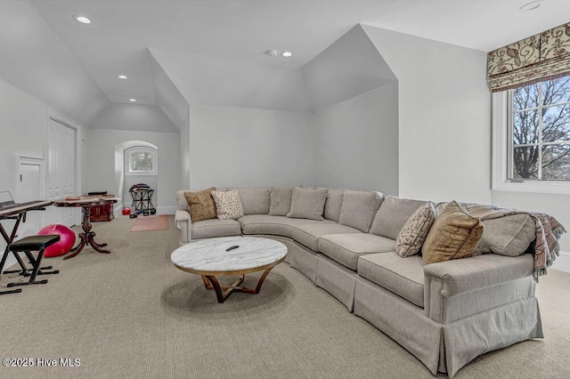 carpeted living room featuring vaulted ceiling, baseboards, and recessed lighting