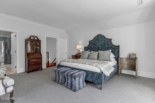 carpeted bedroom with baseboards, visible vents, and ornamental molding