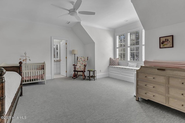 bedroom featuring crown molding, light colored carpet, a ceiling fan, connected bathroom, and baseboards