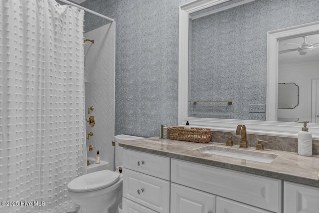 bathroom featuring crown molding, shower / bathtub combination with curtain, toilet, vanity, and wallpapered walls