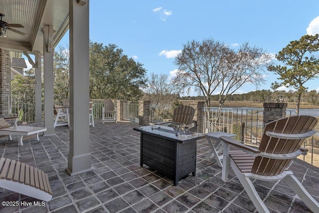 view of patio / terrace featuring ceiling fan