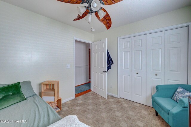 bedroom featuring a ceiling fan and carpet flooring