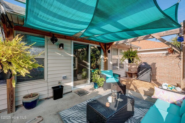 view of patio with an outdoor hangout area